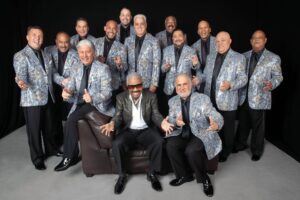 A group of men in suits and ties posing for the camera.